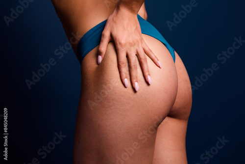 No retouch cropped photo of lady hips underwear lingerie accepting stretch marks skin isolated blue color background