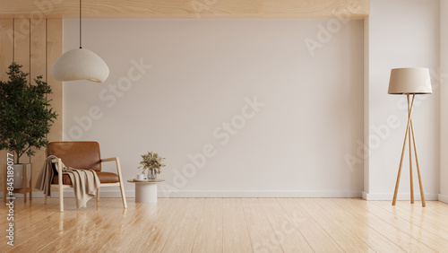 Minimal room with an leather armchair on empty white wall background- 3D rendering