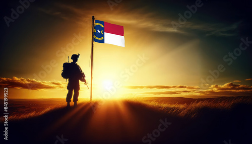 A soldier standing beside the North Carolina flag at sunset, symbolizing courage and dedication to the nation