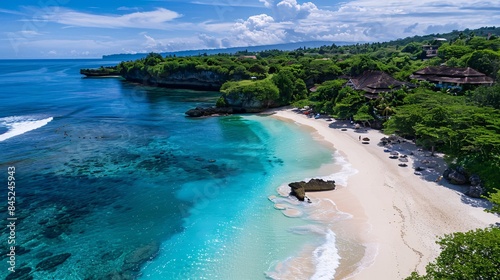 Top-down view of an exquisite freedom beach with powdery white sand, bordered by verdant greenery and kissed by azure waters, where gentle waves lap against the rocky coastline, offering a serene and
