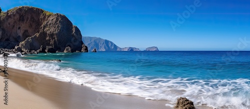 Beautiful sea cliff beach sunny day. Creative banner. Copyspace image