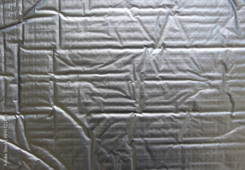 Sound deadening mat puffy metallic industrial background