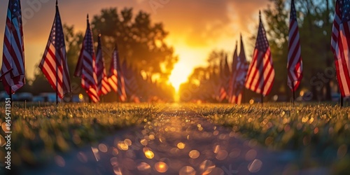 American flags lined up at sunset