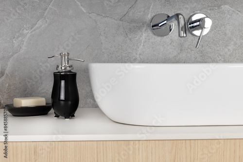 Minimalist Bathroom Sink with Black Accessories