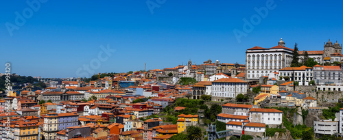 Panoramic view of UNESCO world heritage site Porto city in Portugal during sunny day.