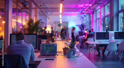 Digital agency office, with laptops, and people, purple light. Generative AI.