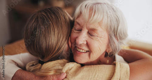 Woman, love and hug senior mom in home for mothers day, bonding and visit in retirement with care or happy. Person, smile and embrace with elderly parent for reunion, comfort and affection in hospice
