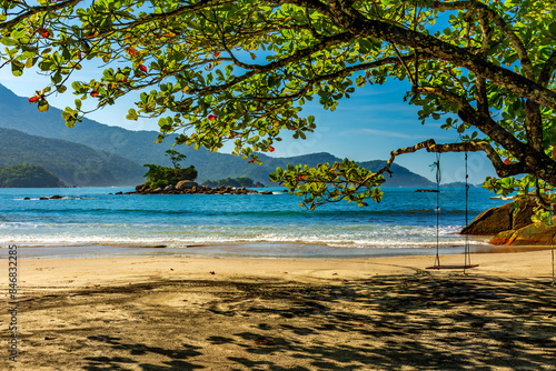 Wild beach of Castelhanos and its paradisiacal tropical landscape on the island of Ilhabela in Sao Paulo