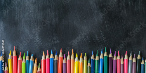 Colorful Pencils on Chalkboard Background - Back to School Art Supplies
