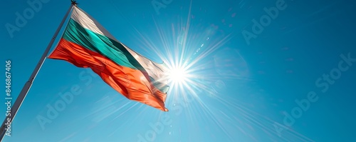Belarus flag fluttering against a clear, sunny sky