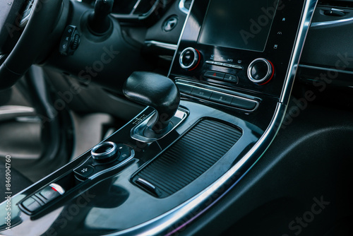 automatic transmission shift selector in the car interior. Closeup a manual shift of modern car gear shifter