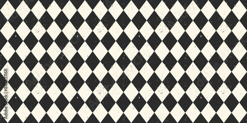 Distressed Diamond Check Pattern seamless background. Black and white Harlequin pattern with dirty texture. Pattern swatch is included.