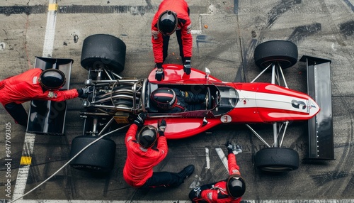 Formula one pit stop red jumpsuit crew showcases teamwork in competitive racing