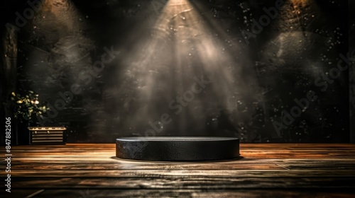 3d rendering of a dark and moody product display stage with a spotlight.