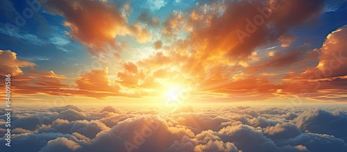 Colorful dramatic sky with cloud at sunset Sky with sun background. Creative banner. Copyspace image