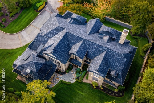 Beautiful Roof. Aerial View of Large House with New Asphalt Shingle Roof on Property