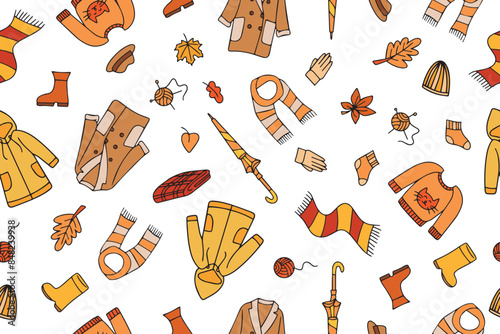 Seamless pattern of Autumn clothes, leaves, umbrellas and other hand-drawn accessories. Collection of autumn items in doodle style. Vector