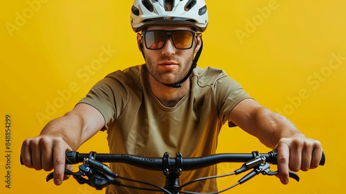 A close-up side view of a man wearing a helmet and sunglasses, riding a mountain bike against a yellow background. Generative AI