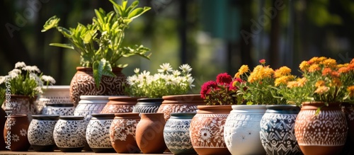 Sell various handmade decorative flower pots with a new ceramic pottery pattern in a garden vase design featuring unique clay handicraft ideal copy space image