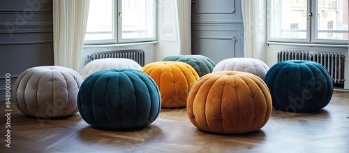 Stylish and comfortable poufs enhance the room s design aesthetics with copy space image opportunities