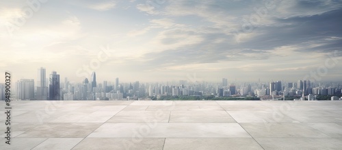 Marble ground devoid of people with a view of a contemporary cityscape in the background ideal for incorporating text or graphics in a copy space image