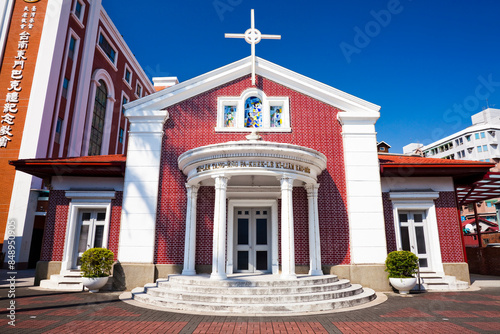 Building view of East Gate Barclay Memorial Church in Tainan, Taiwan. Built in 1926 features Grecian gables and Roman arches.