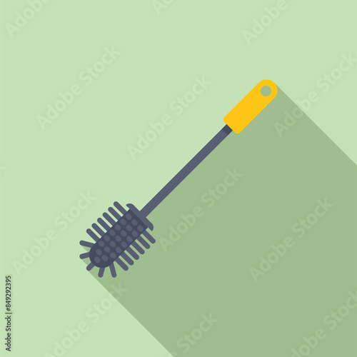 Toilet brush cleaning tool lying on green background with shadow