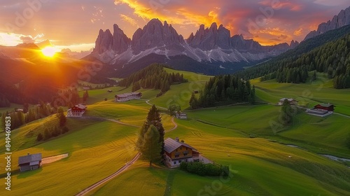 An aerial view of the Dolomites in Cortina d'Ampezzo at sunset, showcasing five towering peaks, lush green valleys, and scattered rustic houses.