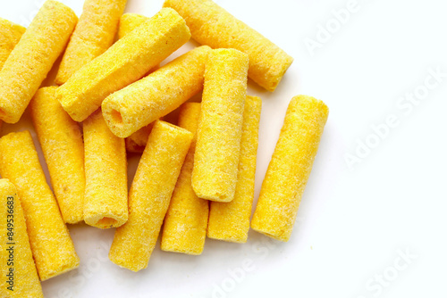 Roller corn snack on white background