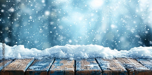 An icy winter table with a snowy plank and a cold sky capped with snowfall