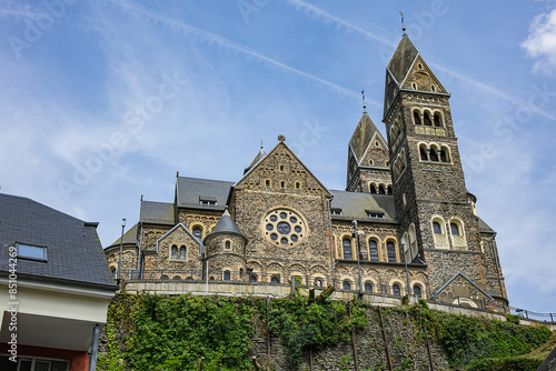 View of Saints Cosmas and Damian Church (Eglise Saints-Come-et-Damien) with two spires. Clervaux, Luxembourg.