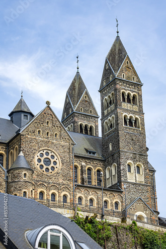 View of Saints Cosmas and Damian Church (Eglise Saints-Come-et-Damien) with two spires. Clervaux, Luxembourg.