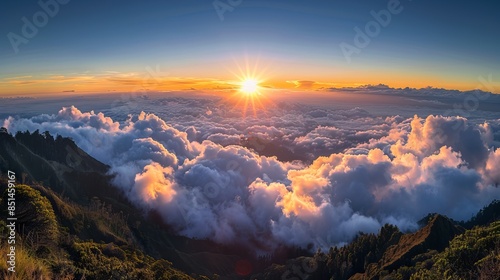 A breathtaking sunset view from the Irazu Volcano, overlooking its crater above the clouds with the Turrialba Volcano and national park visible in the background, captured in Costa Rica.