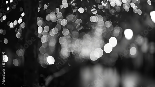 Create a blurred background with bokeh lights in monochrome
