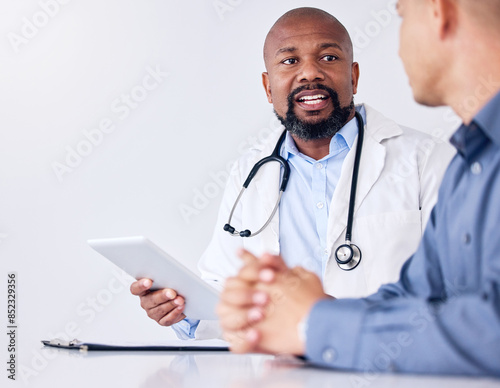 Doctor, patient and discussion with man or tablet, results consultation and medical advice for treatment. Diagnosis, professional and healthcare communication, clinic check up and people talking