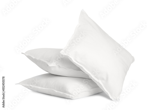 Many new soft pillows isolated on white