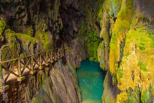 Beautiful colours inside the Iris Grotto at the Cola de Caballo Waterfall in the Monasterio de Piedra Natural Park, Aragon