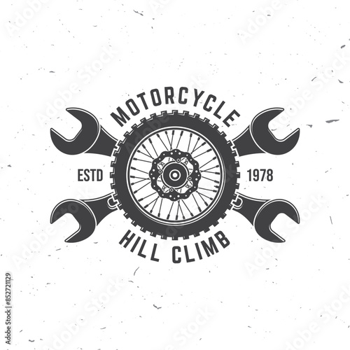 Motorcycle hill climb logo, badge, sticker. Vector illustration. Extreme sport with motorcycle wheel and wrenches. Monochrome style motorcycle wheel and wrenches