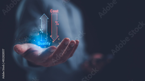 Quality control concept: A businessman holds symbols showing an upward arrow Quality and a downward arrow Cost management aimed at controlling expenses while product and service quality.