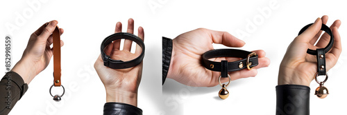 A set of Hand holding pet collars with a bell for the dog isolated on a transparent background 