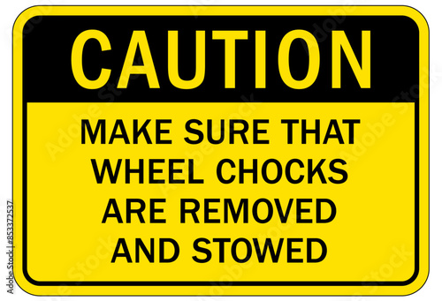 Chock wheels warning sign make sure that wheel chocks are removed and stowed