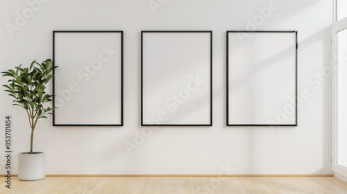 Trio of vertical posters in a clean, white-walled room, modern and minimalist design, ideal for mock-up displays, natural light enhancing the presentation