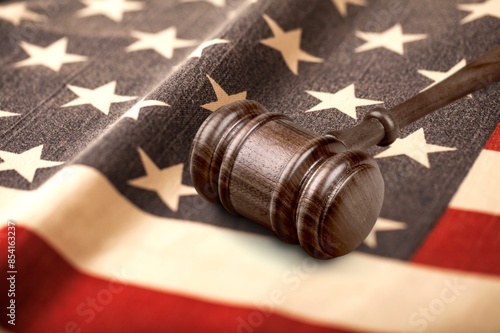 Judge's wooden gavel and USA flag