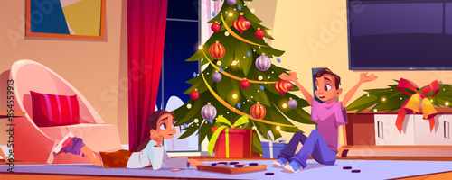 Family celebrate Christmas with gift box and tree in living room. Kid character sitting on floor near present and xmas decoration in apartment. Funny sister and brother together talk in evening
