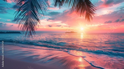Panoramic sunset view of the beautiful coast, with turquoise sea next to fine sandy beaches and palm trees