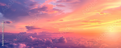 A colorful sunset sky background with gradients of orange, pink, and purple. The textured clouds and soft lighting create a serene and picturesque scene.
