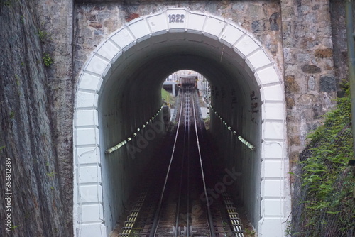 A tunnel with a white sign that says 1912