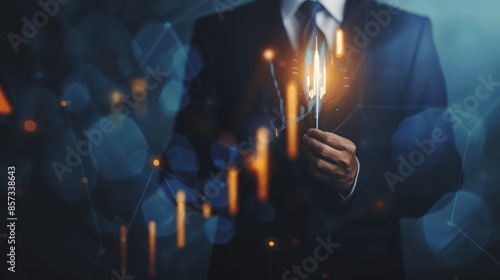 a man in a suit holding a candle