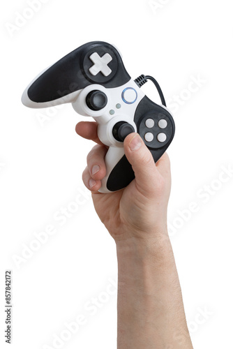 Hand holding a black and white game controller with analog sticks and buttons, isolated on a white background