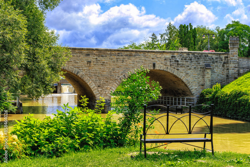 Huron Street Bridge, Shakespearean gardens, Stratford, On, Canada. This stone bridge was built in 1885, is the only double-arched bridge in North America still in use for automotive traffic.